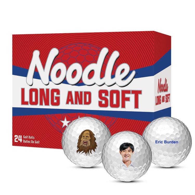 Box of Noodle golf balls with three custom balls in front